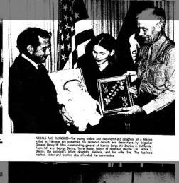 mom getting jacks purple heart and medals